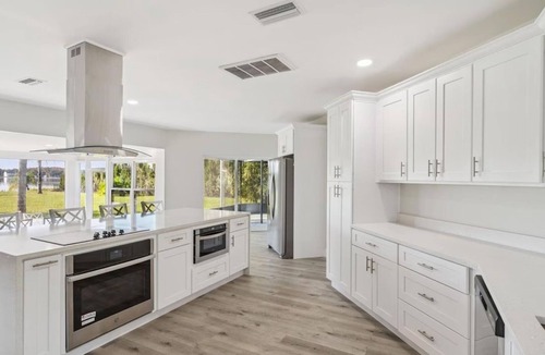 Pine Castle Villa | 4BR Lakefront Home w/Dock & Private Views