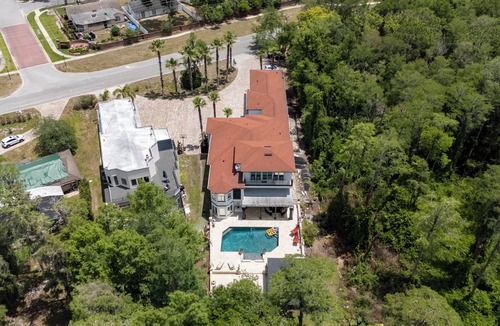 Orlando House | 5BR Lakefront Home w/Pool, Spa, Theater, Dock & Game Room