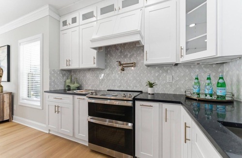 Buford Highway House | A newly constructed home with four bedrooms and four bathrooms.