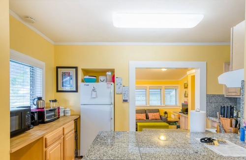Tarpon River House | Adorable, dog-friendly home with a large yard, AC, washer/dryer, & fast WiFi