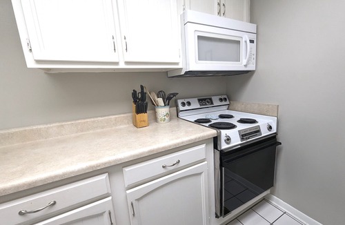 Avon By The Sea Condo | Affordable ONE BR Main Floor Condo RIGHT ON THE BEACH - KING Bed & Heated POOL!