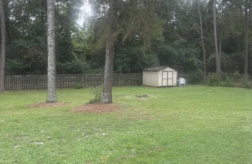 Bath House | Alex’s Legacy 3 bedroom Oasis with private pool and fenced in yard.