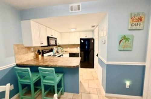 Port Canaveral Condo | Amazing First Floor Condo steps from the Beach w/breathtaking views - sleeps 6