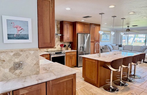 Fort Myers House | Amazing Lounge space at the water! Southern Exposure, Heated Pool & Kayaks!
