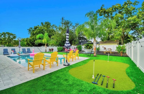 Sun Bay South House | Backyard Paradise: Private Pool, Golf & Fire Pit
