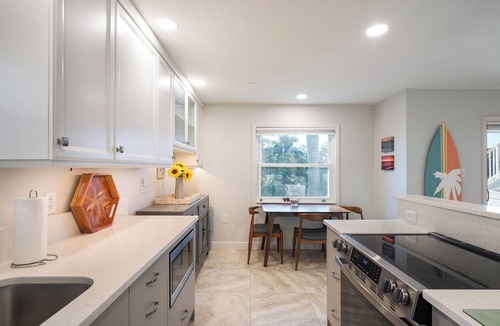Anna Maria Condo | Bayou Breeze Amazing Waterfront Condo on Pine Ave with Dock and Water Views