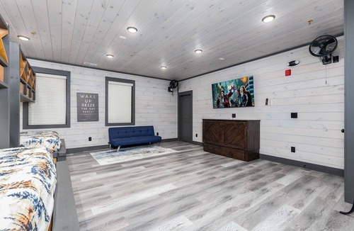 Gatlinburg Cabin | Bear Mountain Lodge | 18BR Luxury Cabin w/Pool, Theater, Mini Golf, Sleeps 86