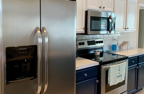 Florida Ridge House | Beautiful 3 Bedroom 2 Bath Home with Heated Private Pool. Sleeps 6 to 8.