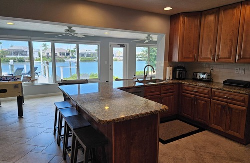 Apollo Beach House | Beautiful Waterfront Home w/Access to Bay, Swim Spa Pool, Hot Tub, Boat Dock.