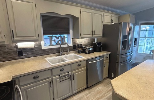 New London House | Bigfoot’s Badin Retreat in Badin Shores Resort - Golf Cart - Family Fun
