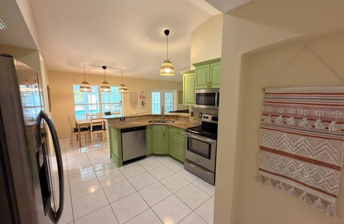 Florida Central Atlantic Coast House | Boho Pool Retreat 6BR Sleeps 18 Near Parks