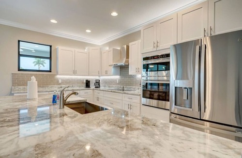 Burnt Store Apartment | Brand New 5 Bedroom Heated Pool Home with 6 Beds