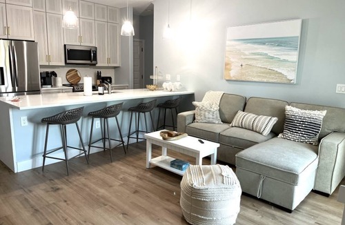 Tropic House | Brand new riverfront luxurious townhome with Interior designer finishes.