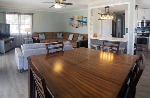Butler Beach House | Cabana Escape – Waterfront Oasis with Heated Pool and Spacious Outdoor Living