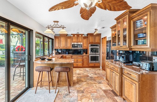 Cocoa Isles House | Canal Access: Boat Lift, Heated Pool & Dock