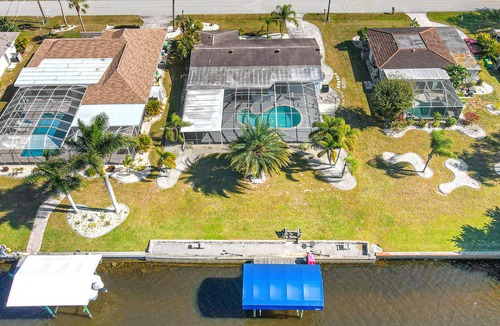 Port Charlotte House | Canal Front, Pool, Reel Paradise