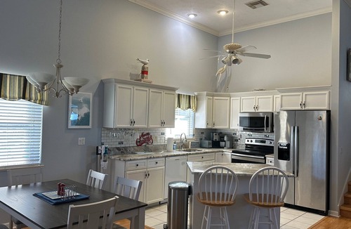 Nettles Island House | Canal Front! Stunning, beautifully updated 3-bedroom, 2.5-bath coastal-style beach home
