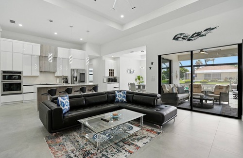 Trafalgar Villa | Casa Elena - 4 bed/3 bath w. heated pool on fresh water canal - game room!