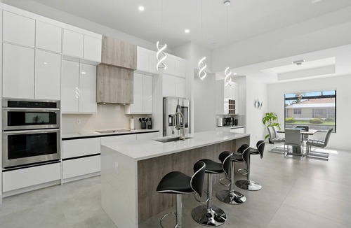 Trafalgar Villa | Casa Elena - 4 bed/3 bath w. heated pool on fresh water canal - game room!