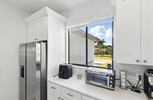 Mariner House | Charming 3-bedroom house with fitness room, WiFi in Tranquil Cape Coral