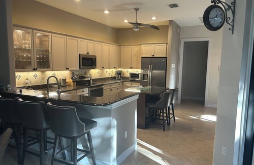 Ole Villa | Charming 3 bedroom villa in Lely Resort Naples with hot tub and waterfall