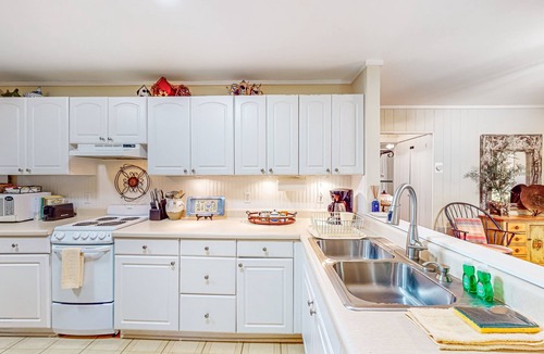 Mirror Lake Cabin | Charming cabin with private deck, fireplace, central AC, & private W/D