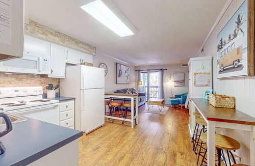 North Forest Beach Condo | Charming Condo 1 block from Coligny Plaza with on site pool, balcony, with Washer Dryer