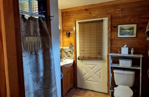 Lake Helen House | Charming Lakefront Room with Private Porch & Canoe Rentals Near Lake Helen, Florida
