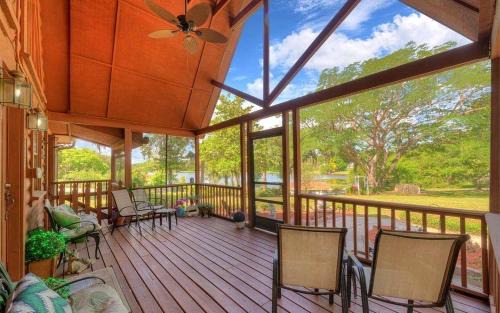Lake Helen House | Charming Lakefront Room with Private Porch & Canoe Rentals Near Lake Helen, Florida