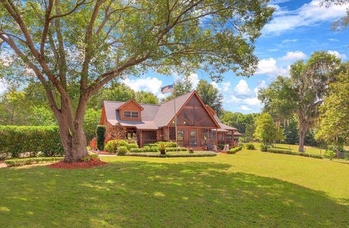 Lake Helen House | Charming Nautical-Themed Inn Room with Private Whirlpool & Lake Views Near Lake Helen, Florida