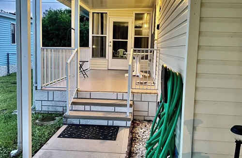 Barefoot Bay House | Cheerful Barefoot Bay vacation rental