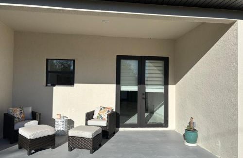 Punta Gorda House | Chic New Build Duplex with King Suite and Cover Lanai