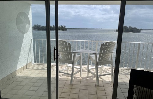 Sebastian Condo | Coastal Beach style condo with private balcony and boat slip.