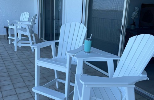Sebastian Condo | Coastal Beach style condo with private balcony and boat slip.