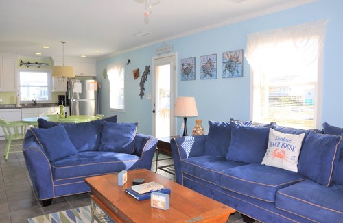 Holden Beach House | Coastal bungalow charm with dock, porch views, and easy beach access in a renovated retreat