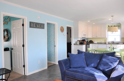 Holden Beach House | Coastal bungalow charm with dock, porch views, and easy beach access in a renovated retreat