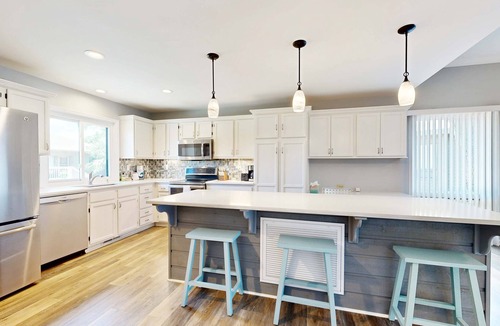 Summerwind Villas Condo | Coastal retreat with fireplace, AC, grill, lagoon views and close to beach