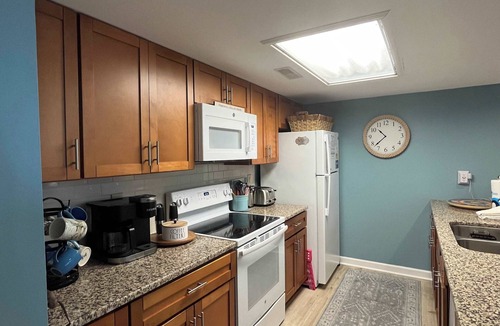 Ocean Ridge Condo | Coastal townhome with riverfront views, deck, & W/D - pool and athletic courts