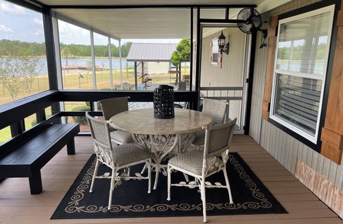 Moultrie House | Completely renovated mobile home sitting own a pond.