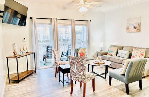 Myrtle Beach Condo | Condo on IntraCoastal Waterway- elevator, pool, host pups, near beach and golf.