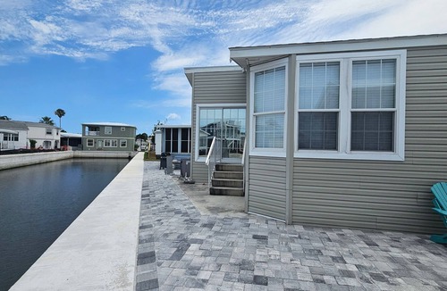 Nettles Island Cottage | Coral Cabana, 166 Nettles - Dockside Beauty!