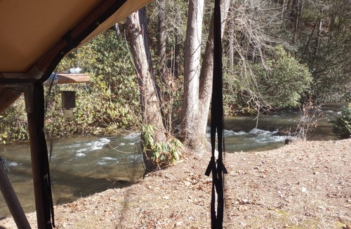 Murphy RV Rental | Creek Front Safari Tent-Furnished, relaxing under the stars, Firepit, Smores.