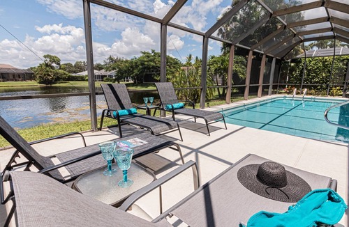 Crown Pointe House | Crown Pointe lake view heated pool home (w/2 King bedrooms) minutes to downtown & beaches!