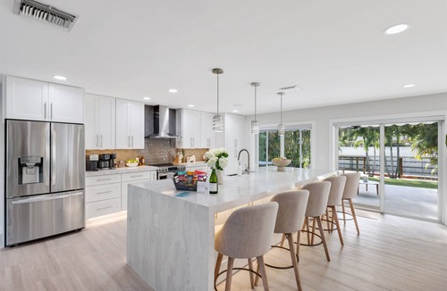 Lake Ida Shores Villa | Direct Lake Ida Access | Sleeps 8 | Golf Cart | Heated Pool | by Delray Nightly