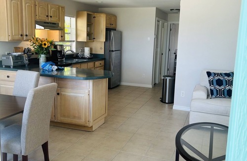 Goodland Apartment | Direct panoramic waterfront views