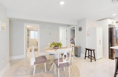 Isles of Capri Condo | Dog-friendly colorful condo with shaded patio, washer/dryer, & central AC