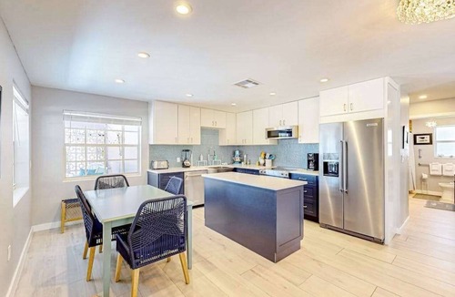 Isles of Capri House | Enchanting dog-friendly beach bungalow with patio, fireplace, deck, AC, & W/D