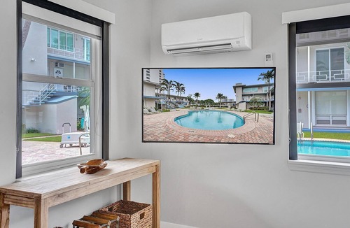 East Fort Lauderdale Condo | Enjoy scenic sunsets on your private deck. Modern condo minutes to the beach.