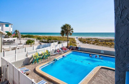 Treasure Island Condo | Escape to Romantic 4th Floor Beachfront Stateroom with Beach View: Beach, Pool, Tiki Bar, Grills