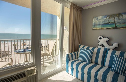 Treasure Island Condo | Escape to Romantic 4th Floor Beachfront Stateroom with Beach View: Beach, Pool, Tiki Bar, Grills